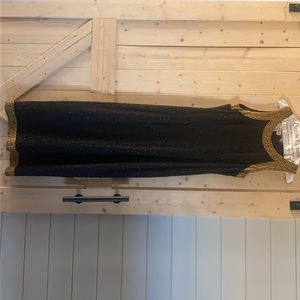 Long, black and fitted dress